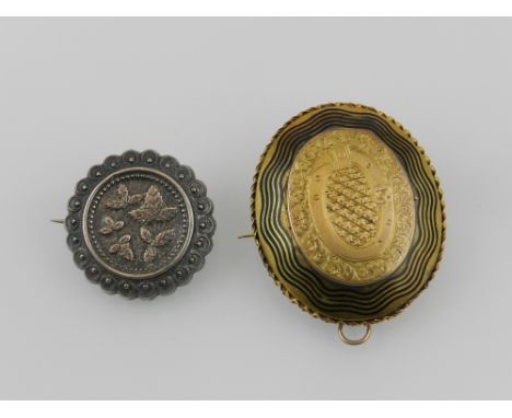 A gilt metal Momento Mori pendant having hinged locket revealing portrait of a gentleman, with glass aperture to verso, toget