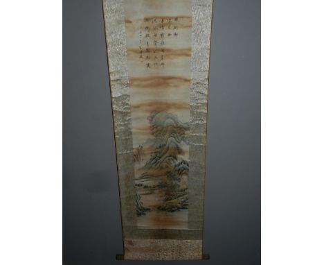 A Chinese scroll, decorated with landscape scene and Chinese characters