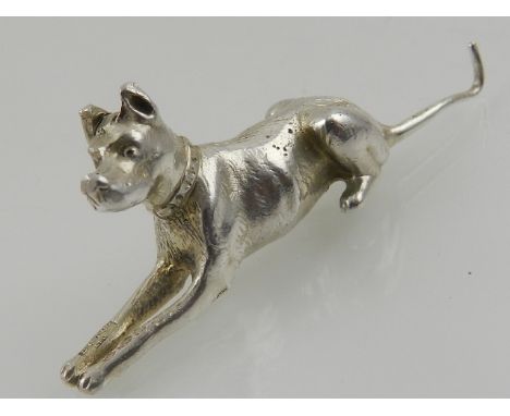 A hallmarked silver model of a hunting dog.