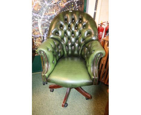 Good quality Green Leather chesterfield button back Elbow chair on swivel base 