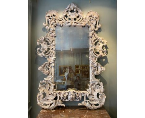 A Mid 18th Century English carved Roccoco frame of large proportions, formerly The Royal Collection, Buckingham Palace.The re