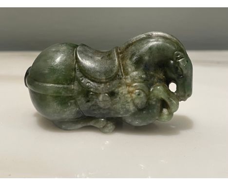 A Jade Chinese Recumbent Horse. 18th / 19th Century. Dimensions:1.5 in (H) x 2.5 in (L)