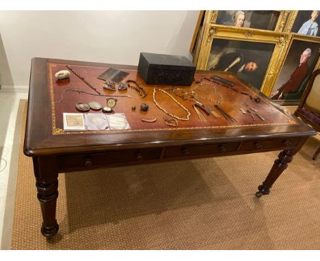 Property of a Lady A Victorian partner's library centre table in mahogany, with 3 drawers to either side, the top with a red 