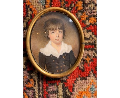 [?]Property of a Gentleman An oval portrait miniature of a young boy in an oval frame. Attributed to George Engleheart, (1750