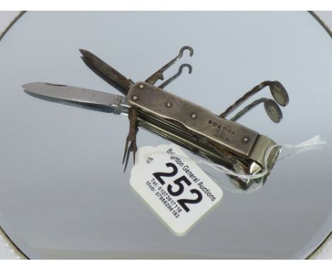 VICTORIAN HALL MARKED SILVER HANDLED SMOKERS KNIFE WITH PIPE TAMPER, CHEROOT CUTTER, KNIFE & OTHERS INCLUDING MANICURE ITEMS.