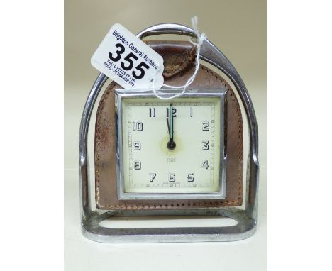 SMITHS ALARM CLOCK MOUNTED ON LEATHER WITHIN A STIRRUP