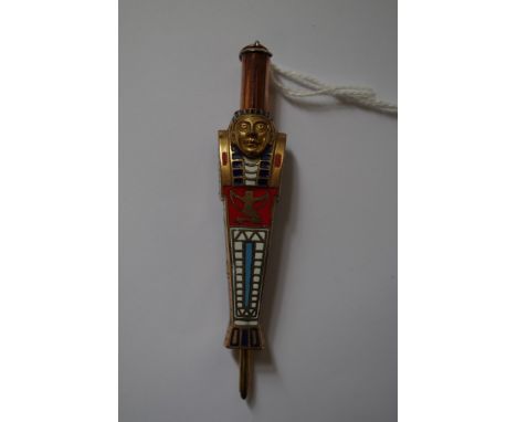 An Egyptian Revival figural gilt and ble and red enamel propelling pencil. 