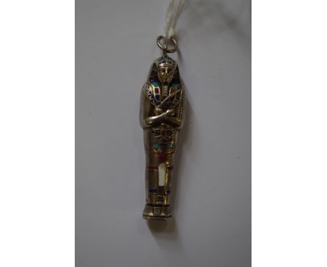 An Egyptian Revival figural silver and enamel propelling pencil. 