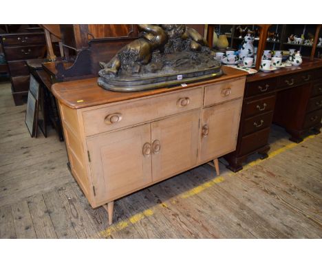 A vintage Ercol elm top sideboard,&nbsp;with original blonde, 122.5cm wide.&nbsp; 