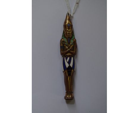 An Egyptian Revival figural gilt and enamel propelling pencil. 