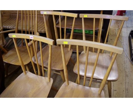 A set of four vintage Ercol dining chairs. 