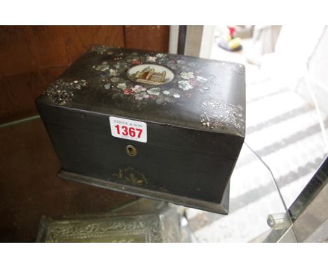 A 19th century papier-mache and mother of pearl tea caddy,&nbsp;the hinged top inset with a picture of St Paul's cathedral, 1