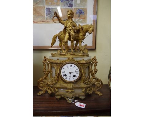 A late 19th century gilt spelter and alabaster mantel clock,&nbsp;39.5cm high.&nbsp; 