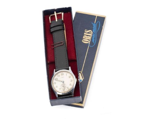 A vintage Oris gentlams's wristwatch. Swiss manual winding movement. Silver tone circular dial, Oris signature with luminous 