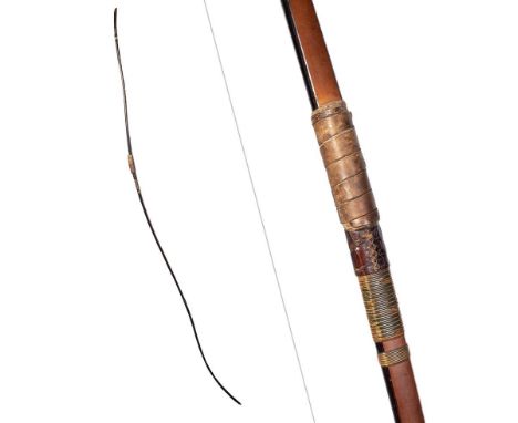 c19th Japanese Samurai Yumi bow for Kyudo art archery constructed of lacquered bamboo embellished with deer and lizard skin, 