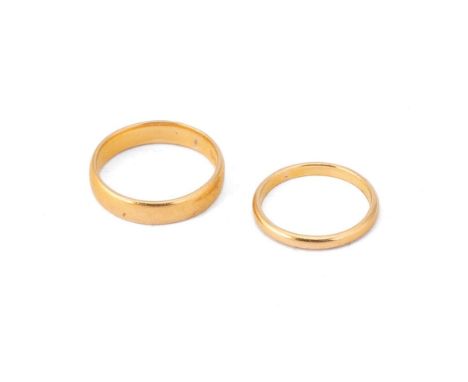 Two 22ct gold wedding bands, 7.0g, smaller size K, larger size O/P (2).