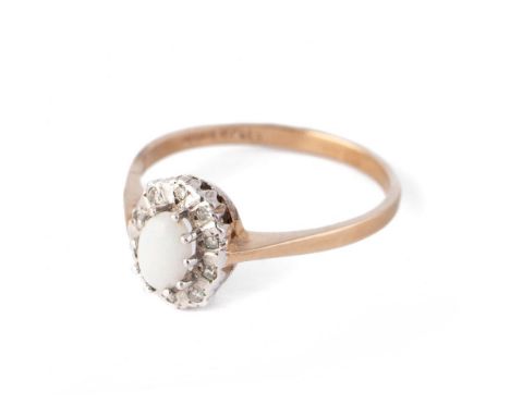 9ct yellow gold ring set with opal and diamonds. Ring size P. Weight 2g.