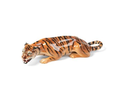 Royal Doulton crouching Tiger HN225 in natural colours.  In good condition with no obvious damage or restoration. Light scrat
