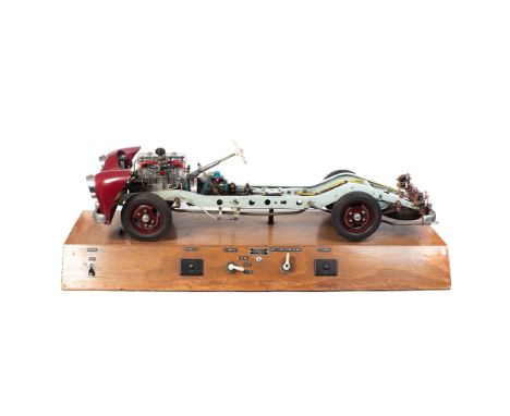 A Holm large scale instructional working model car mounted on a wooden plinth. Manufactured by Holm Models Germany. Post-War 