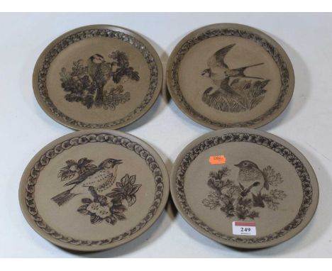 A set of four Poole Pottery stoneware plates of British Garden Birds, to include the Robin No. 2847/5000, the Songthrush No. 