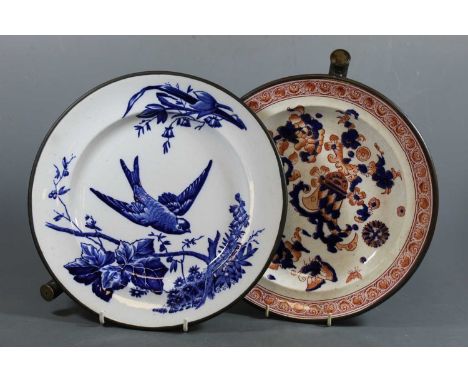 A Victorian warming plate, possibly James F. Wileman, the plate blue and white transfer decorated with a swallow before a flo