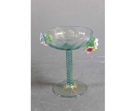 A 20th century  blue tinted art glass table bowl together with two others and a small glass vase (4)