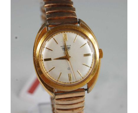 A gent's Heuer gold plated and steel backed automatic wristwatch, circa 1970s, having a signed silvered dial with baton marke