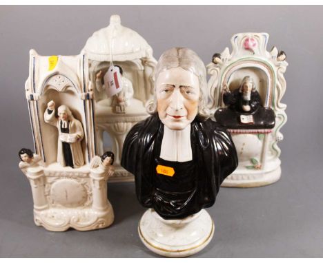 A 19th century Staffordshire portrait bust of John Wesley, on a socle base, 29cm high, together with three other Staffordshir