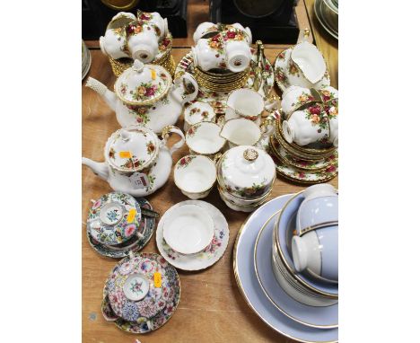 An extensive Royal Albert tea service in the Old Roses Country pattern, together with a Royal Albert Lavender Rose pattern su