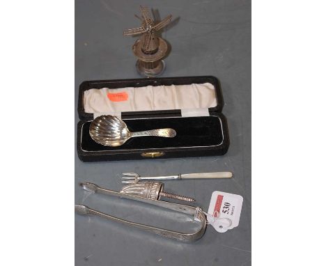 A small collection of miscellaneous silver and white metal items, to include a 19th century silver caddy spoon, having shell 