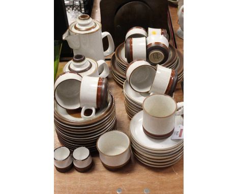 A Denby 8-place setting stoneware tea and dinner serviceCondition report: One coffee pot – spout chipped.One teapot – lid and