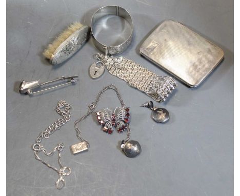 A George V silver pocket cigarette case, having engine turned decoration, initialled cartouche and gilt-washed interior; toge