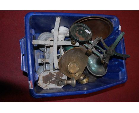 A collection of assorted grocer's scales and weights 
