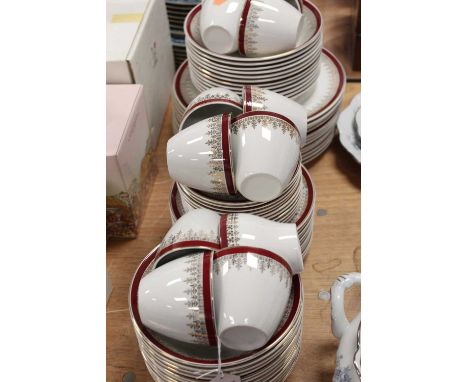 A mid 20th century Myott 12-place setting part tea and dinner service in the Royalty pattern