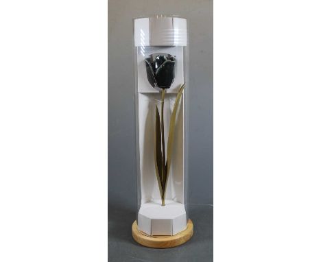 Tulips by Paul Cummins, a ceramic model of a tulip within perspex display case, boxed with certificate