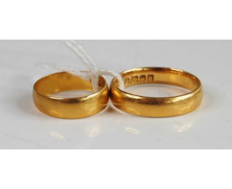 A 22ct gold wedding band, size O/P; together with one other size I, gross weight 7.9g (2)