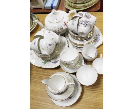 A Coalport 8-place setting tea service in the Paradise pattern 
