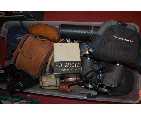 A box of miscellaneous items to include a Kodak Brownie Junior Camera, a Polaroid flash gun No. 268, various cased binoculars