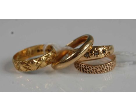 Four assorted rings - A 9ct yellow gold 3.15mm court shaped wedding ring, finger size N, gross weight 3.0g, hallmarked 9ct, B