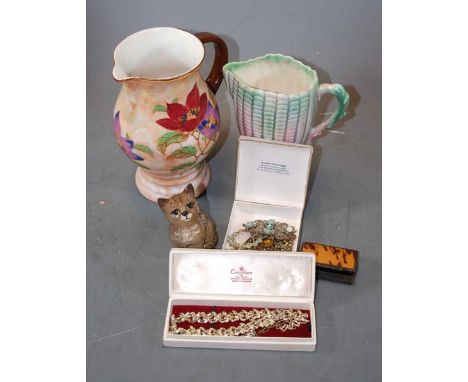 A small collection of miscellaneous items, to include a Royal Doulton jug in the Magnolia pattern D6298, Beswick model of a k