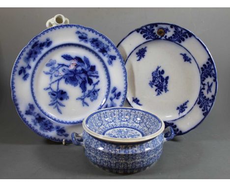 An early 19th century pearlware warming dish, the removable shallow bowl resting upon a twin handled base, decorated in the L