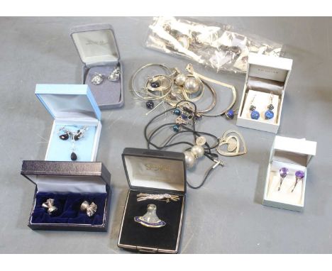 A small collection of mainly silver and white metal jewellery, to include continental silver torque bangle, lapis lazuli drop