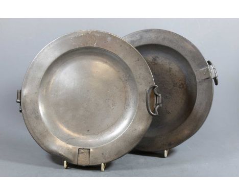 An early 20th century copper warming dish and cover, of circular form, having interior plate, on a blue ground with floral bo