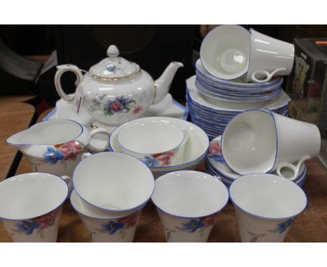 An early 20th century Shelley part tea service in the Regent shape, pattern No. WS2174 (incomplete, some seconds), together w