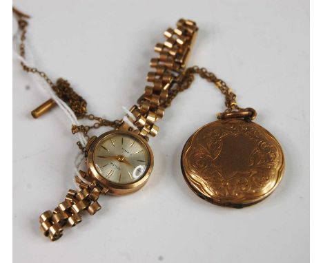 A Volga 9ct gold cased lady's manual wind wristwatch, having signed champagne dial, on rolled gold bracelet; together with a 