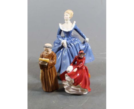A Royal Worcester porcelain candle-snuffer in the form of a monk, h.12cm; together with two Royal Doulton figures Fragrance a