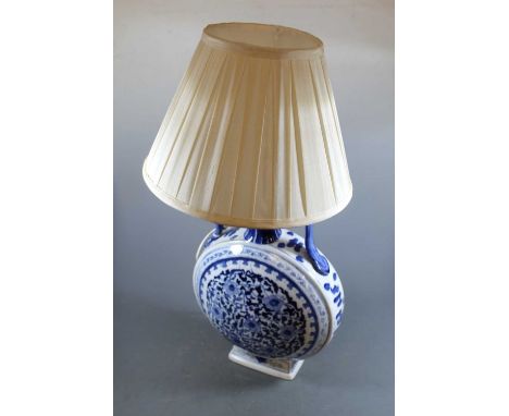 A Chinese export stoneware blue &amp; white moon vase, converted into a table lamp, the onion neck flanked by twin handles, t