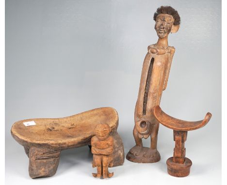 Afrikan. Alltagszubehör, 4-tlg.Verschied. Tropenhölzer, unlackiert, handgeschnitzt: Pfeifenständer ca. 50cm, einbeinige Nacke