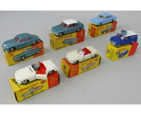 Dinky - Six die-cast models comprising; No. 113 M.G.B. Sports Car (x2), No. 130 Ford Consul Corsair, No. 135 Triumph 2000, No