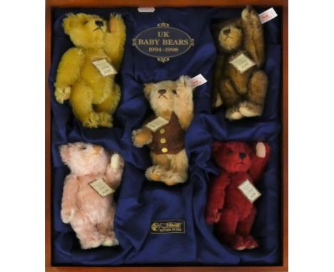 A Steiff boxed set of UK Baby Bears, 1994-1998, No. 654695, in fitted softwood presentation box comprising of five miniature 